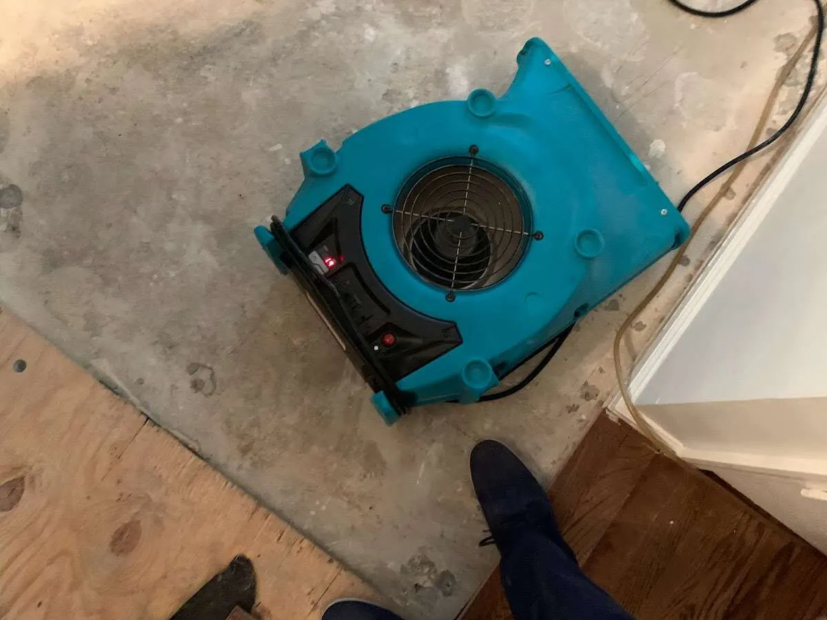 Air mover drying subfloor during Leak Detection & Repair in Reynoldsburg